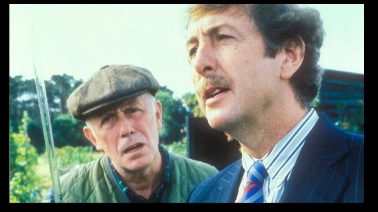 One Foot in the Grave: The Man In The Long Black Coat backdrop
