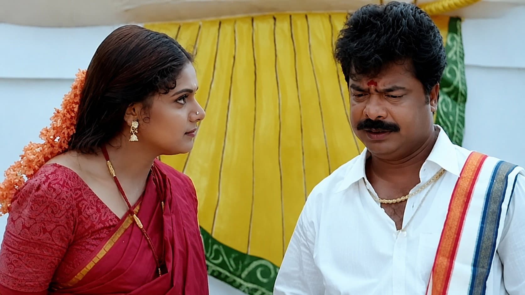 Anbu Thollai backdrop