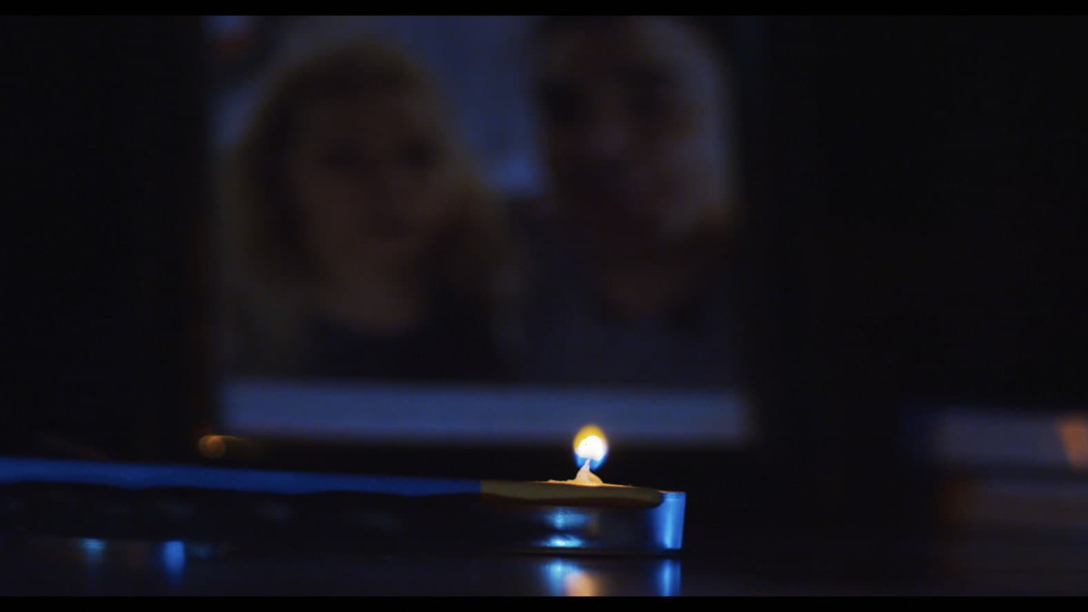 A Candle in the Dark backdrop